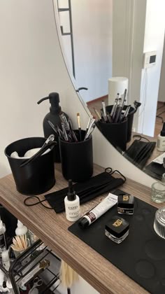 the vanity is full of makeup and personal care items