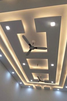 the ceiling is decorated with modern lighting