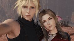 two people standing next to each other in the desert