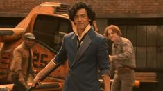 a man in a blue suit holding a baseball bat