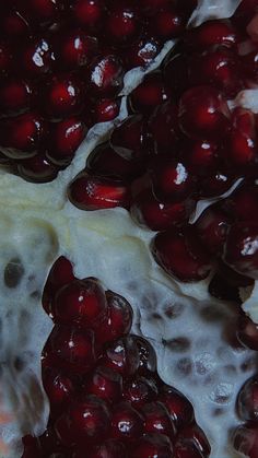 pomegranates and other fruits are mixed together