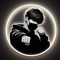 a man wearing a black face mask in front of a neon circle with his fist raised