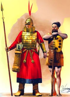 two men dressed in roman armor standing next to each other
