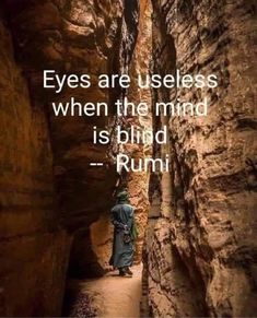 a person standing in the middle of a narrow canyon with a quote on it that says,