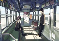 two people sitting on a bus looking out the window