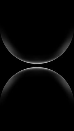 an abstract black and white background with two circles in the shape of a circle on top of each other