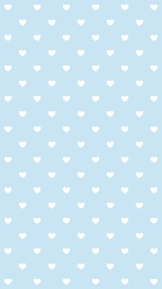 a blue background with white hearts on it