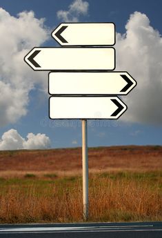 an arrow sign pointing to different directions in the middle of nowhere royalty images and stock photos