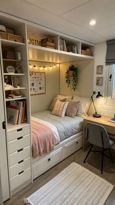 a small bedroom with a bed, desk and bookshelf in the corner is lit by lights