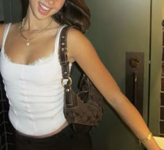 white top, vintage coach bag Purse Aesthetic Outfit, Purse Outfit Aesthetic, Shoulder Bag Aesthetic Outfit, Shoulder Purse Outfit, Brown Shoulder Bag Outfit Aesthetic, Vintage Guess Bag Outfit, Lace Cami Aesthetic, Brown Bag Outfit Aesthetic, Y2k Coach Bag Outfit