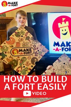 a young boy holding up some paper cut outs with the words how to build a fort easily