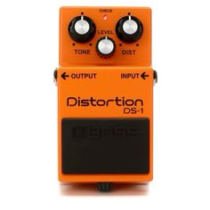 an orange distortion guitar pedal over white background