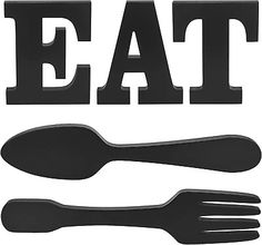 the word eat is made up of black plastic forks and spoons