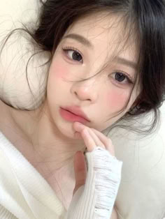 pink makeup look: soft, nude pink eyes, blush, and lips