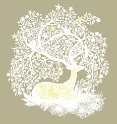 a white deer sitting under a tree with snowflakes
