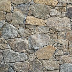 a stone wall that is made out of rocks