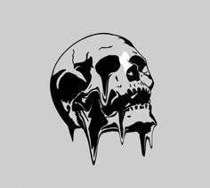 a black and white image of a skull with fangs on it's face, in front of a gray background