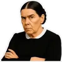 a woman with her arms crossed is wearing a black sweater with a white collar