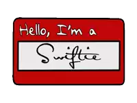 a red name tag says hello i 'm swiftie