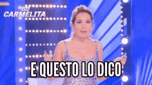 a woman in a sequined dress says " e questo lo dico "