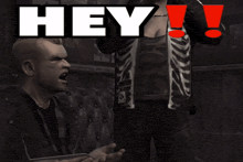 a man is pointing at a woman with the word hey behind him