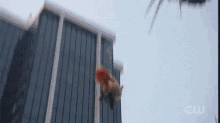 a person is falling from a tall building .