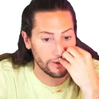 a man with long hair and a beard is covering his nose