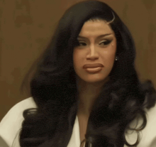 a close up of a woman with long black hair