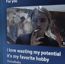 a picture of a girl smoking a cigarette with the caption i love wasting my potential
