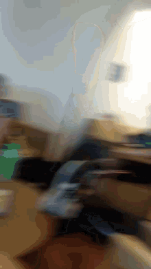 a blurry picture of a classroom with a sign that says ' a ' on it