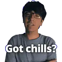 a man wearing glasses and a grey shirt says " got chills "