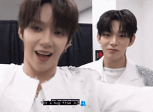 two young men are standing next to each other and one of them says or a hug from jl