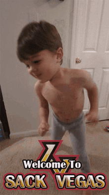a shirtless little boy is dancing in front of a sign that says welcome to sack vegas
