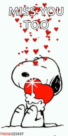snoopy is holding a red heart in his mouth and hearts are falling from the sky .