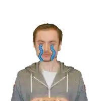 a man in a hoodie is crying with blue tears coming out of his eyes
