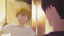 a boy with yellow hair is looking at another boy
