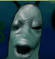 a close up of a monster 's face with horns