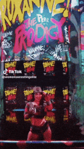 a woman is standing in front of a sign that says " the pera prodigy "