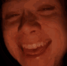 a close up of a man 's face with the word yoking written on it .