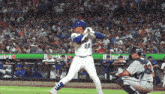 a mets player getting ready to swing at a ball