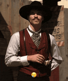 a man wearing a cowboy hat and vest stands in front of a sign that says 75 cents