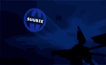 a silhouette of a man standing in front of a batman logo that says suubie