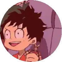 a close up of a cartoon character holding a necklace with his tongue out .